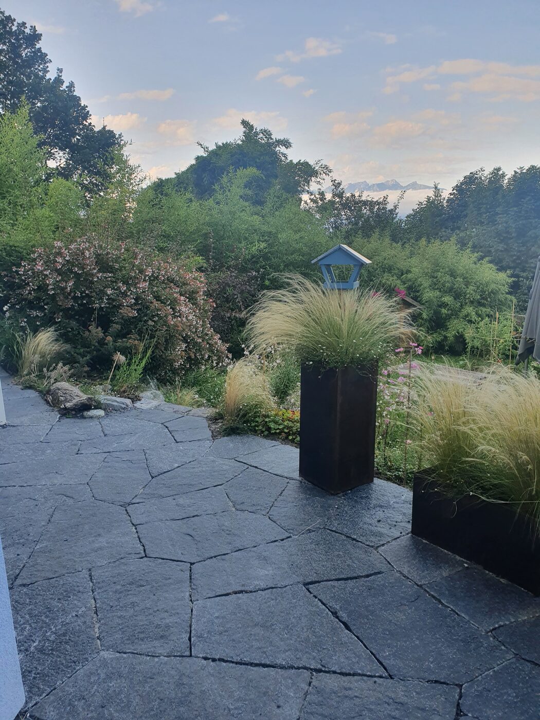 Stone terrace and soft planting